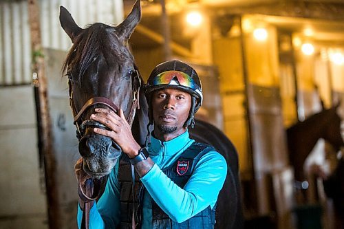 MIKAELA MACKENZIE / WINNIPEG FREE PRESS

Trainer Devon Gittens and horse Purrsistent pose for a portrait at the Assiniboia Downs backstretch in Winnipeg on Friday, Sept. 4, 2020. For George Williams story.
Winnipeg Free Press 2020.