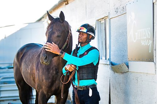 MIKAELA MACKENZIE / WINNIPEG FREE PRESS

Trainer Devon Gittens and horse Purrsistent pose for a portrait at the Assiniboia Downs backstretch in Winnipeg on Friday, Sept. 4, 2020. For George Williams story.
Winnipeg Free Press 2020.