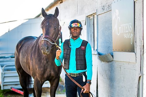 MIKAELA MACKENZIE / WINNIPEG FREE PRESS

Trainer Devon Gittens and horse Purrsistent pose for a portrait at the Assiniboia Downs backstretch in Winnipeg on Friday, Sept. 4, 2020. For George Williams story.
Winnipeg Free Press 2020.