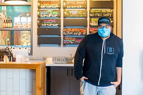 MIKAELA MACKENZIE / WINNIPEG FREE PRESS

Andrew Sookram poses for a portrait at Sookram's brewery in Winnipeg on Friday, Sept. 4, 2020. Sookram's is one of many local breweries with mandatory mask policies. For Ben Sigurdson story.
Winnipeg Free Press 2020.