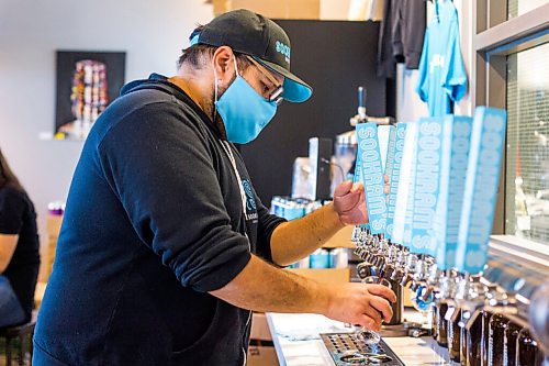 MIKAELA MACKENZIE / WINNIPEG FREE PRESS

Andrew Sookram pours some beers at Sookram's brewery in Winnipeg on Friday, Sept. 4, 2020. Sookram's is one of many local breweries with mandatory mask policies. For Ben Sigurdson story.
Winnipeg Free Press 2020.