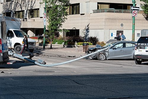 JESSE BOILY  / WINNIPEG FREE PRESS
A car collision caused a road closure at Broadway and Donald st. on Monday. A set of traffic lights was knocked down believed to be done by the collision.Monday, Sept. 7, 2020.
Reporter: Standup
