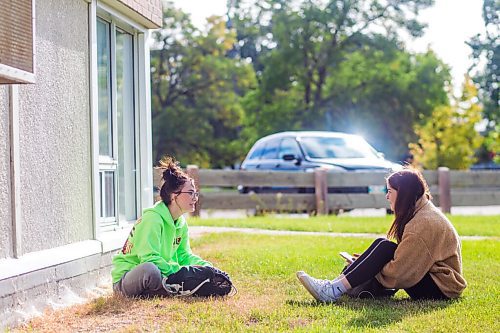 MIKAELA MACKENZIE / WINNIPEG FREE PRESS

Grade 10 students Amilie Hamoline (left) and Nikki MacDonald hang out on their first day of school at Windsor Park Collegiate in Winnipeg on Tuesday, Sept. 8, 2020. For Maggie story.
Winnipeg Free Press 2020.