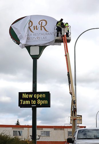 RUTH BONNEVILLE / WINNIPEG FREE PRESS

BIZ - Perkins rebrand to R n R Restaurant 

Description:
The former owners of local Perkins franchises are rebranding three vacant restaurants as a local breakfast/ diner.

Photo of Roger Perron (owner), outside  the 2675 Portage Ave. location where AK Sign Installers are installing the new sign over the old Perkins sign on Tuesday.  

Ben Waldman story 

Sept 8th, 2020