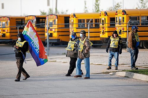 Winnipeg school bus drivers and supporters picket outside the Winnipeg School Division bus depot in Winnipeg Wednesday, September 9, 2020. Bus drivers hit the picket lines this morning. THE CANADIAN PRESS/John Woods