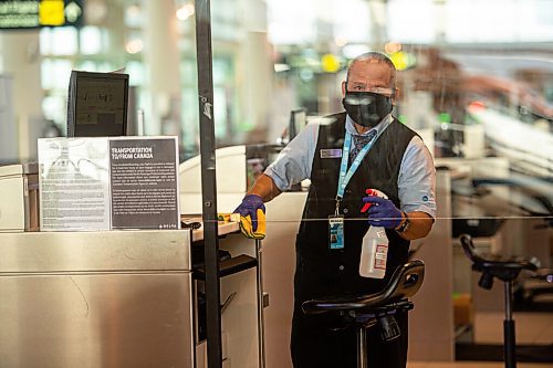 Mike Sudoma / Winnipeg Free Press
A worker sanitizes a terminal at the Richardson International Airport Wednesday morning
September 9, 2020
