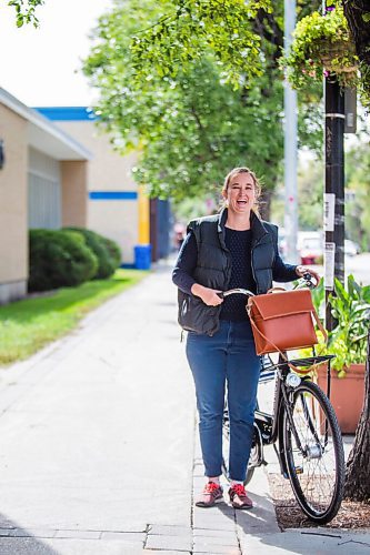 MIKAELA MACKENZIE / WINNIPEG FREE PRESS

Cyclist Leigh Anne Parry poses for a photo on Sherbrook Street in Winnipeg on Wednesday, Sept. 9, 2020. For JS story.
Winnipeg Free Press 2020.