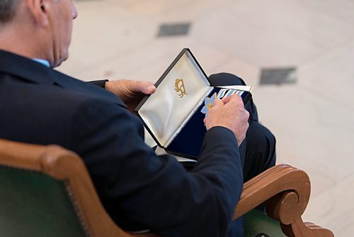 JESSE BOILY  / WINNIPEG FREE PRESS
Dr. Stephen Borys looks over his Order of Manitoba at the investiture ceremony in the Legislative building on Thursday. Twelve Manitobans were inducted into the Order of Manitoba, the provinces highest honour.  Thursday, Sept. 10, 2020.
Reporter: Standup