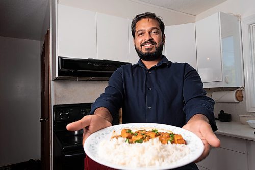 JESSE BOILY  / WINNIPEG FREE PRESS
Ashish Selvanathan, owner of Cheeky Foods, shows some of his butter chicken at his mothers kitchen on Friday. Friday, Sept. 11, 2020.
Reporter: Dave Sanderson