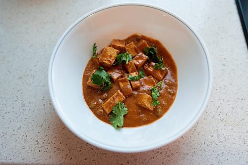 JESSE BOILY  / WINNIPEG FREE PRESS
Ashish Selvanathan, owner of Cheeky Foods, shows some of his butter chicken at his mothers kitchen on Friday. Friday, Sept. 11, 2020.
Reporter: Dave Sanderson