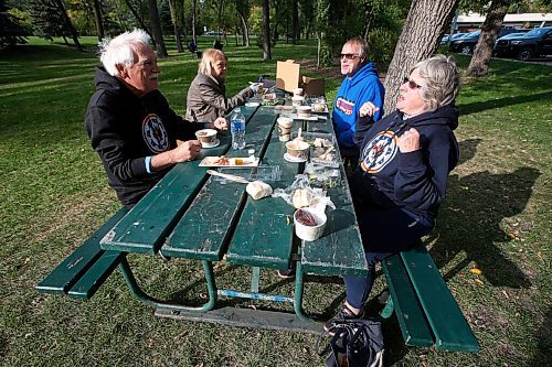 JOHN WOODS / WINNIPEG FREE PRESS
Gary Borodenko, from left, Cheryl and Ken Miller and Linda Borodenko enjoy the picnic dinner in Kildonan Park before the Pot of Gold Benefit Concert at Rainbow Stage in Winnipeg Sunday, September 13, 2020. 

Reporter: Malak