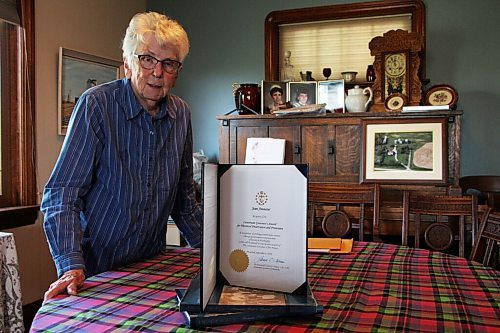 Canstar Community News Jean Ammeter stands in her dining room with her new historical preservation award from Manitobas lieutenant-governor on Sept. 9. Ammeter recieved the award from Lt.-Gov. Janice Filmon on Sept. 8. (GABRIELLE PICHE/ CANSTAR COMMUNITY NEWS/ HEADLINER)