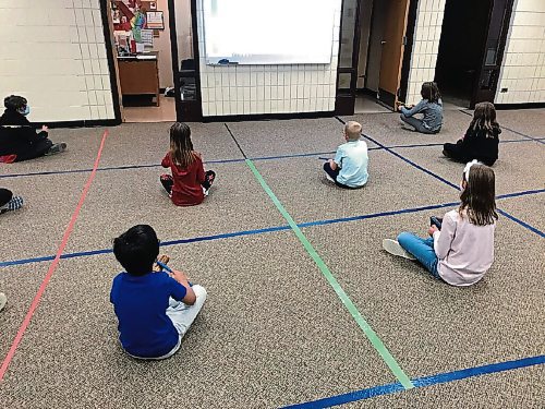 Canstar Community News Early years students at Bernie Wolfe Community School (95 Bournais St.) practice social distancing in their first music class of the year. (SHELDON BIRNIE/CANSTAR/THE HERALD)