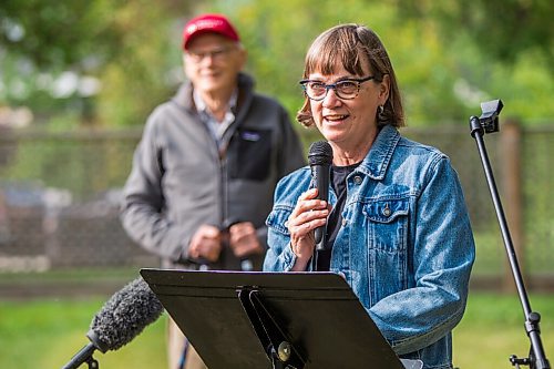 MIKAELA MACKENZIE / WINNIPEG FREE PRESS

Eleanor Wiebe, daughter of Winnipeg arts lover Douglas MacEwan, speaks at a press conference in her father's backyard in Winnipeg on Tuesday, Sept. 15, 2020. MacEwan is walking one kilometer every day for 96 days in order to raise $96,000 to be divided evenly between Winnipegs four major performing arts organizations (Manitoba Opera, the Royal Manitoba Theatre Centre, Royal Winnipeg Ballet, and the Winnipeg Symphony Orchestra). For Eva Wasney story.
Winnipeg Free Press 2020.