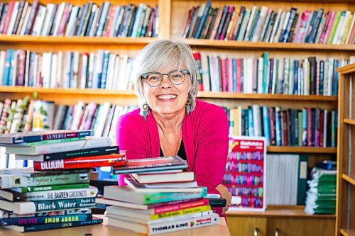 MIKAELA MACKENZIE / WINNIPEG FREE PRESS

Thin Air director Charlene Diehl poses for a portrait in her book-filled office at Artspace in Winnipeg on Wednesday, Sept. 16, 2020. This year's festival is going virtual. For Ben Sigurdson story.
Winnipeg Free Press 2020.