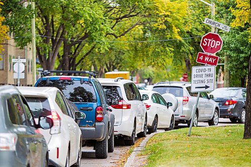 MIKAELA MACKENZIE / WINNIPEG FREE PRESS

Traffic lines up down multiple blocks of Charles Street for COVID-19 drive-through testing in Winnipeg on Thursday, Sept. 17, 2020. For Danielle story.
Winnipeg Free Press 2020.