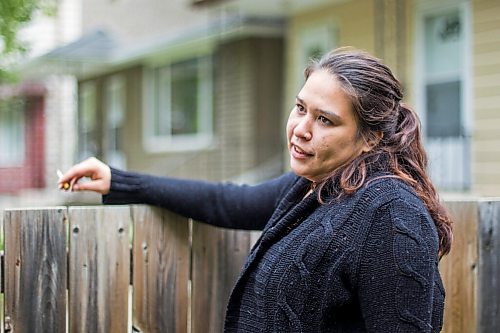 MIKAELA MACKENZIE / WINNIPEG FREE PRESS

Sylver Ballantyne speaks to the Free Press about traffic lining up in front of her home on Charles Street for COVID-19 drive-through testing in Winnipeg on Thursday, Sept. 17, 2020. For Danielle story.
Winnipeg Free Press 2020.