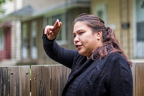 MIKAELA MACKENZIE / WINNIPEG FREE PRESS

Sylver Ballantyne speaks to the Free Press about traffic lining up in front of her home on Charles Street for COVID-19 drive-through testing in Winnipeg on Thursday, Sept. 17, 2020. For Danielle story.
Winnipeg Free Press 2020.