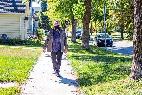 MIKAELA MACKENZIE / WINNIPEG FREE PRESS

Resident Tom Pearson, who is concerned with the lack of consultation and potential issues with more open streets in his community of Riverview, walks down his residential sidewalk in Winnipeg on Thursday, Sept. 17, 2020.  For Joyanne story.

Winnipeg Free Press 2020