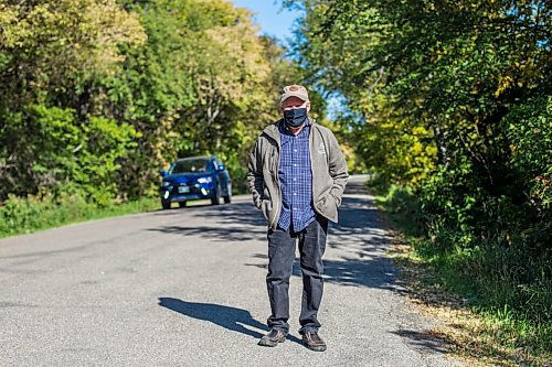 MIKAELA MACKENZIE / WINNIPEG FREE PRESS

Resident Tom Pearson, who is concerned with the lack of consultation and potential issues with more open streets in his community of Riverview, poses for a portrait on Churchill Drive in Winnipeg on Thursday, Sept. 17, 2020.  For Joyanne story.

Winnipeg Free Press 2020