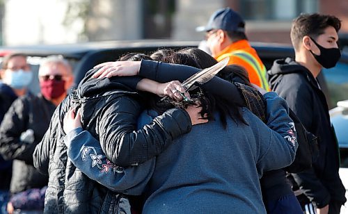 JOHN WOODS / WINNIPEG FREE PRESS
Family and friends comfort each other prior to a search for Katelyn Fontaine along Main St in Winnipeg Thursday, September 17, 2020. Fontaine was last in contact with family on September 3.

Reporter: ?