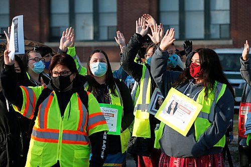 JOHN WOODS / WINNIPEG FREE PRESS
Family and friends who gather for a search for Katelyn Fontaine along Main St raise their hands in order to be registered in Winnipeg Thursday, September 17, 2020. Fontaine was last in contact with family on September 3.

Reporter: ?