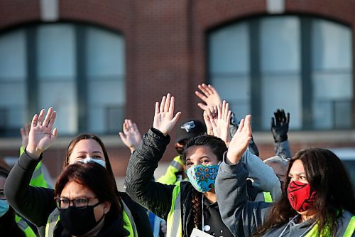 JOHN WOODS / WINNIPEG FREE PRESS
Family and friends who gather for a search for Katelyn Fontaine along Main St raise their hands in order to be registered in Winnipeg Thursday, September 17, 2020. Fontaine was last in contact with family on September 3.

Reporter: ?