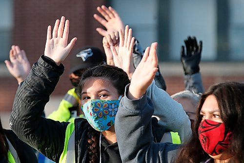 JOHN WOODS / WINNIPEG FREE PRESS
Family and friends who gather for a search for Katelyn Fontaine along Main St raise their hands in order to be registered in Winnipeg Thursday, September 17, 2020. Fontaine was last in contact with family on September 3.

Reporter: ?