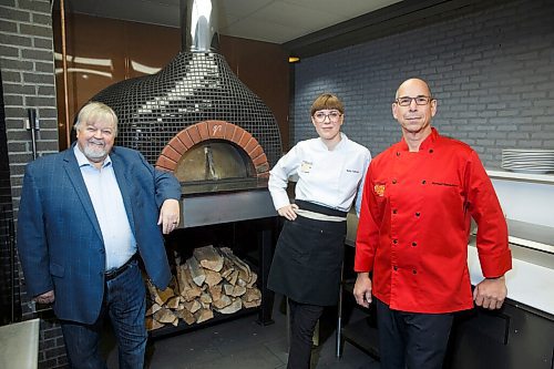 MIKE DEAL / WINNIPEG FREE PRESS
(from left) Wow Hospitality president Doug Stephen with the co-owners and head chefs, Kelly Cattani and Michael Dacquisto in the two-in-one restaurant concept Bluestone Cottage/Alena Rustic Italian at 3670 Roblin Blvd.
200918 - Friday, September 18, 2020.