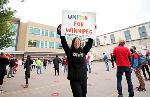 RUTH BONNEVILLE / WINNIPEG FREE PRESS

LOCAL STDUP - united way

Julia Richard, a United Way volunteer, holds poster stating - United For Winnipeg, at the kick-off for rally Friday. 

2020 Volunteer Campaign Chair, Dave Angus, volunteers, supporters and others kick off community-wide rally for recovery and inclusion during United Way Winnipegs Walk This Way event at 580 Main Street Friday. 

See press release for more details.  

Sept 18th, 2020
