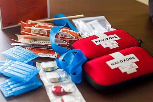 MIKAELA MACKENZIE / WINNIPEG FREE PRESS

Tammy Reimer poses for a portrait with naloxone kits and harm reduction supplies in her office at Nine Circles in Winnipeg on Friday, Sept. 18, 2020.  For Katie May story.

Winnipeg Free Press 2020