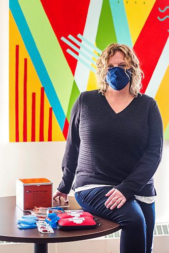 MIKAELA MACKENZIE / WINNIPEG FREE PRESS

Tammy Reimer poses for a portrait with naloxone kits and harm reduction supplies in her office at Nine Circles in Winnipeg on Friday, Sept. 18, 2020.  For Katie May story.

Winnipeg Free Press 2020