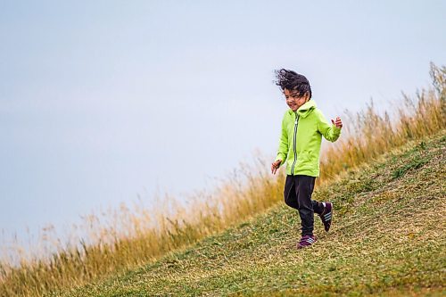 MIKAELA MACKENZIE / WINNIPEG FREE PRESS

Bishop Eugenio (three) runs down a hill on a windy day at Westview Park in Winnipeg on Monday, Sept. 21, 2020.  Standup.

Winnipeg Free Press 2020