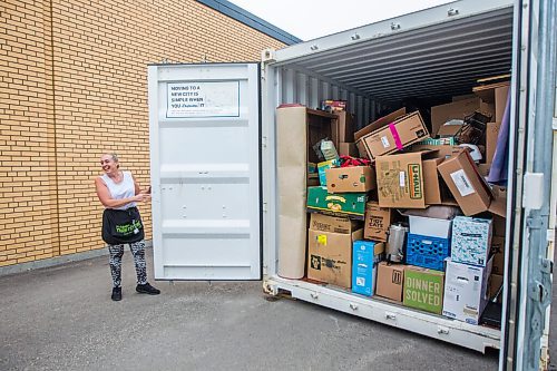 MIKAELA MACKENZIE / WINNIPEG FREE PRESS

Receiver Alison Seavers opens up a full quarantined shipping container (one of the COVID-19 measures the store is taking) at the Mission Thrift Store in Winnipeg on Wednesday, Sept. 23, 2020.  For Frances Koncan story.

Winnipeg Free Press 2020