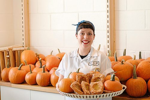 Mike Sudoma / Winnipeg Free Press
Joanne Toupin, owner of Sleepy Owl Bread shows off a fresh batch of pumpkin pie danishes Thursday morning
September 24, 2020