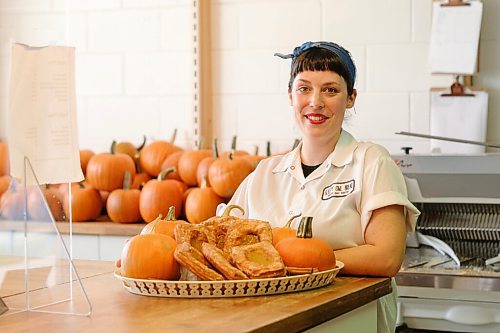 Mike Sudoma / Winnipeg Free Press
Joanne Toupin, owner of Sleepy Owl Bread shows off a fresh batch of pumpkin pie danishes Thursday morning
September 24, 2020