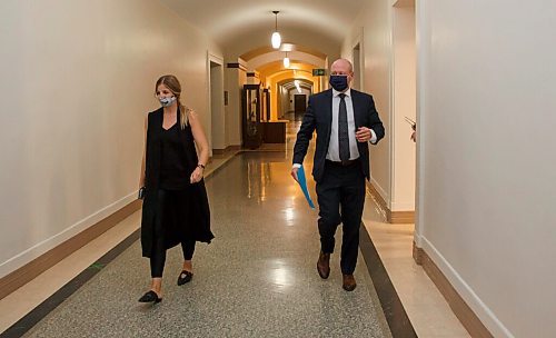 MIKE DEAL / WINNIPEG FREE PRESS
Dr. Brent Roussin, chief provincial public health officer, walks down a hallway in the Manitoba legislative building after his COVID-19 update press conference. He announced that the Winnipeg Metropolitan Region will be going to the Pandemic Response System level, Restricted (Orange), on Monday, September 28.
200925 - Friday, September 25, 2020.