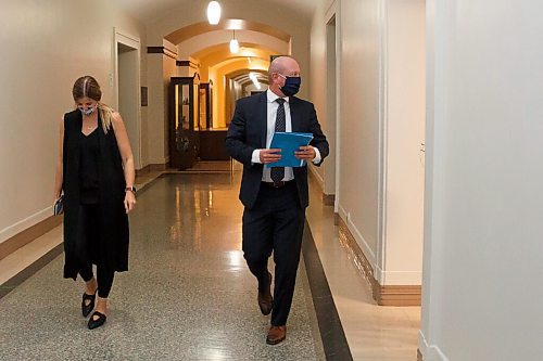 MIKE DEAL / WINNIPEG FREE PRESS
Dr. Brent Roussin, chief provincial public health officer, walks down a hallway in the Manitoba legislative building after his COVID-19 update press conference. He announced that the Winnipeg Metropolitan Region will be going to the Pandemic Response System level, Restricted (Orange), on Monday, September 28.
200925 - Friday, September 25, 2020.