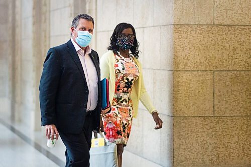 MIKAELA MACKENZIE / WINNIPEG FREE PRESS

Minister of justice Cliff Cullen (left) and PC MLA Audrey Gordon wear masks while walking through the halls at the Manitoba Legislative Building in Winnipeg on Monday, Sept. 28, 2020.

Winnipeg Free Press 2020