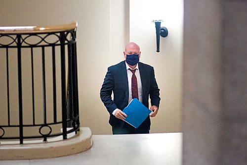 MIKAELA MACKENZIE / WINNIPEG FREE PRESS

Chief public health officer Brent Roussin wears a mask while walking through the halls at the Manitoba Legislative Building in Winnipeg on Monday, Sept. 28, 2020.

Winnipeg Free Press 2020