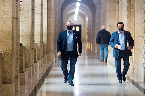 MIKAELA MACKENZIE / WINNIPEG FREE PRESS

Minister of finance Scott Fielding (left) and minister of crown services Jeff Wharton wear masks while walking through the halls at the Manitoba Legislative Building in Winnipeg on Monday, Sept. 28, 2020.

Winnipeg Free Press 2020