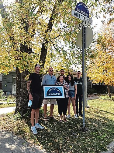 Canstar Community News Family of Jack Wright, 98, who served as a shipwright during the Second World War, were presented with an honourary street sign bearing his name. Sign toppers marking Honourary Jack Wright Way will be in place for five years on the block in Transcona where Wright grew up. (SHELDON BIRNIE/CANSTAR/THE HERALD)