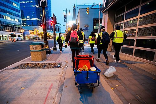 JOHN WOODS / WINNIPEG FREE PRESS
Thunderbirdz, a recently formed community group who conduct walks in different areas of the city to care for homeless and marginalized community members, are photographed downtown Winnipeg assisting and feeding people Monday, September 28, 2020. 

Re: Rutgers
