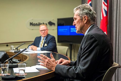 MIKAELA MACKENZIE / WINNIPEG FREE PRESS

Premier Brian Pallister (right) and finance minister Scott Fielding speak to the media at the Manitoba Legislative Building in Winnipeg on Tuesday, Sept. 29, 2020.  For Larry Kusch story.

Winnipeg Free Press 2020