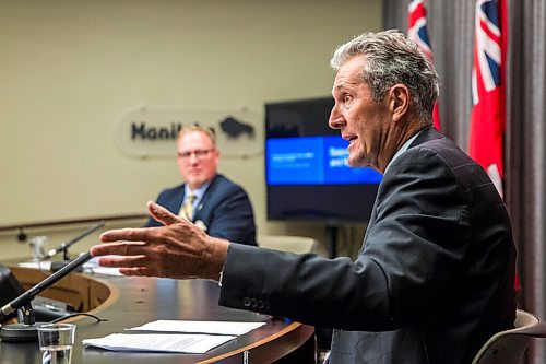 MIKAELA MACKENZIE / WINNIPEG FREE PRESS

Premier Brian Pallister (right) and finance minister Scott Fielding speak to the media at the Manitoba Legislative Building in Winnipeg on Tuesday, Sept. 29, 2020.  For Larry Kusch story.

Winnipeg Free Press 2020