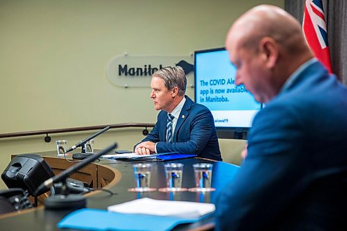 MIKAELA MACKENZIE / WINNIPEG FREE PRESS

Cameron Friesen, minister of health, seniors, and active living (left), and Dr. Brent Roussin, Manitoba's chief public health officer, speak to the media at the Manitoba Legislative Building in Winnipeg on Thursday, Oct. 1, 2020. For Carol Sanders story.

Winnipeg Free Press 2020