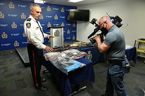 MIKE DEAL / WINNIPEG FREE PRESS
Winnipeg Police Inspector Max Waddell with drugs and guns that were collected during the arrest in June of three men involved in drug trafficking. 
201002 - Friday, October 2, 2020.