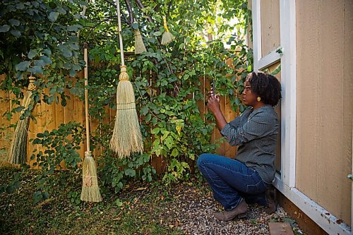 MIKE DEAL / WINNIPEG FREE PRESS
Amina Haswell takes some photos for her instagram page. She recently started a home based broom making business, Prairie Breeze Folk Arts Studio, and was due to make her vendor debut at the Folk Fest this year. 
She makes all kinds of brooms - whisks, cobweb brooms, fireplace brooms, yer basic sweep-the-kitchen brooms  she also makes traditional wedding brooms, and currently has a line of brooms made especially for Halloween - bippity boppity brooms.
See David Sanderson story
201002 - Friday, October 02, 2020.