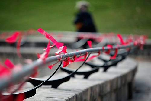 JOHN WOODS / WINNIPEG FREE PRESS
Red ribbons are placed for Murdered and Missing Indigenous Women and Girls (MMIWG) on Red Dress Day at the Forks in Winnipeg Sunday, October 4, 2020. 

Reporter: Katie