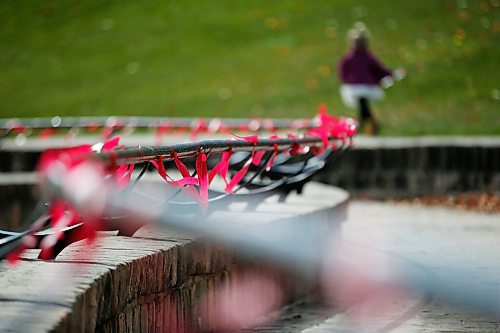 JOHN WOODS / WINNIPEG FREE PRESS
Red ribbons are placed for Murdered and Missing Indigenous Women and Girls (MMIWG) on Red Dress Day at the Forks in Winnipeg Sunday, October 4, 2020. 

Reporter: Katie